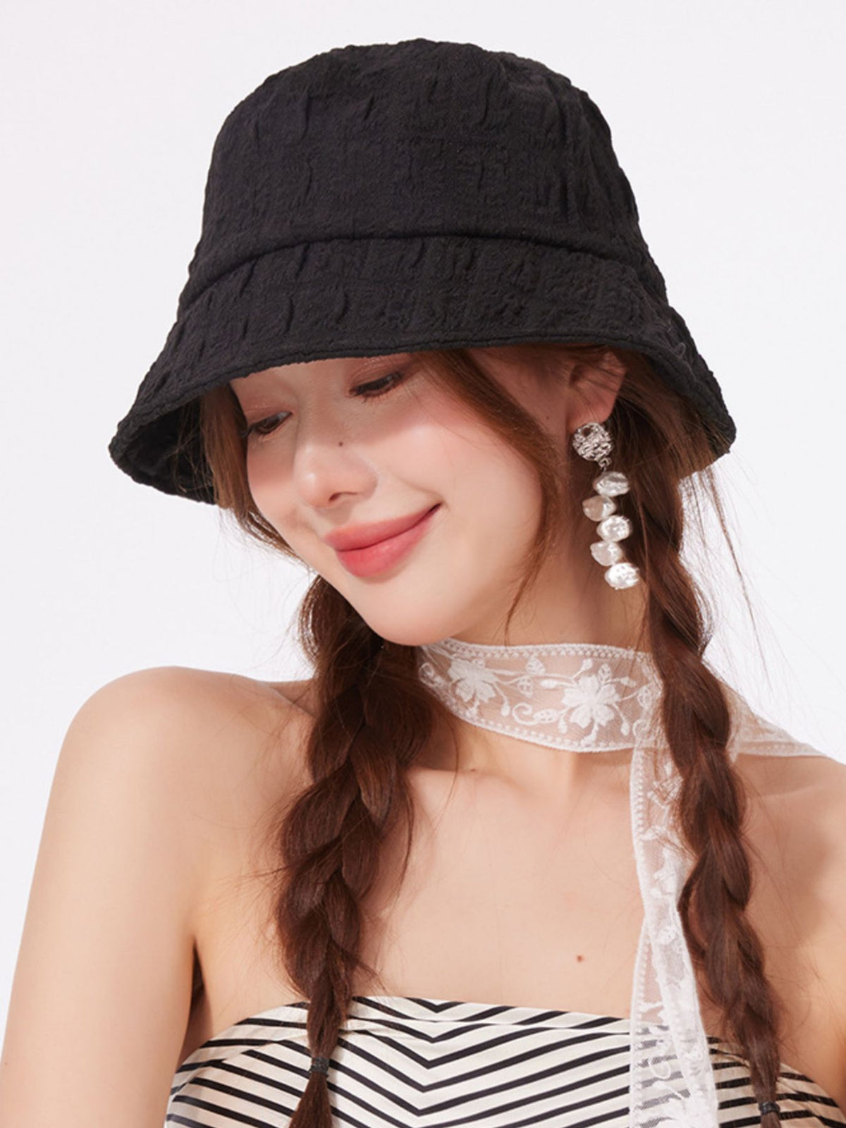 Women's lightweight textured summer bucket hat by Plush Fashion Hub, breathable casual sun hat with a stylish, relaxed design.