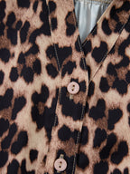 Leopard print short sleeve blouse with lace trim and button front, trendy women's top from Trendsi.
