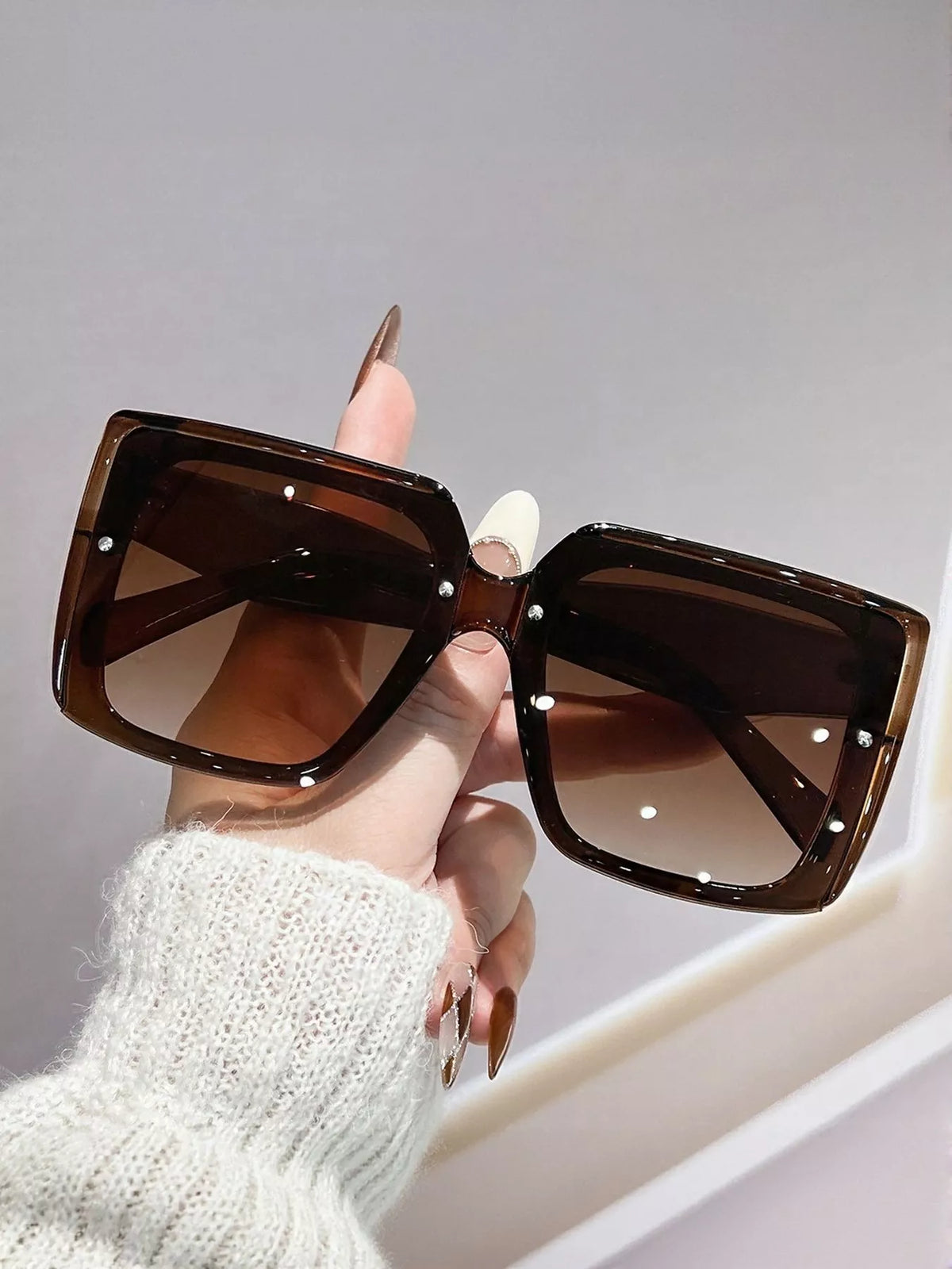Oversized gradient square sunglasses by Plush Fashion Hub with bold frames and tinted lenses, stylish accessories for sunny days.