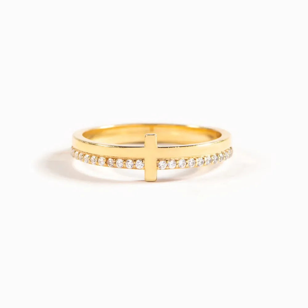 Sterling silver cross ring from Plush Fashion Hub featuring a detailed cross design on a polished band.