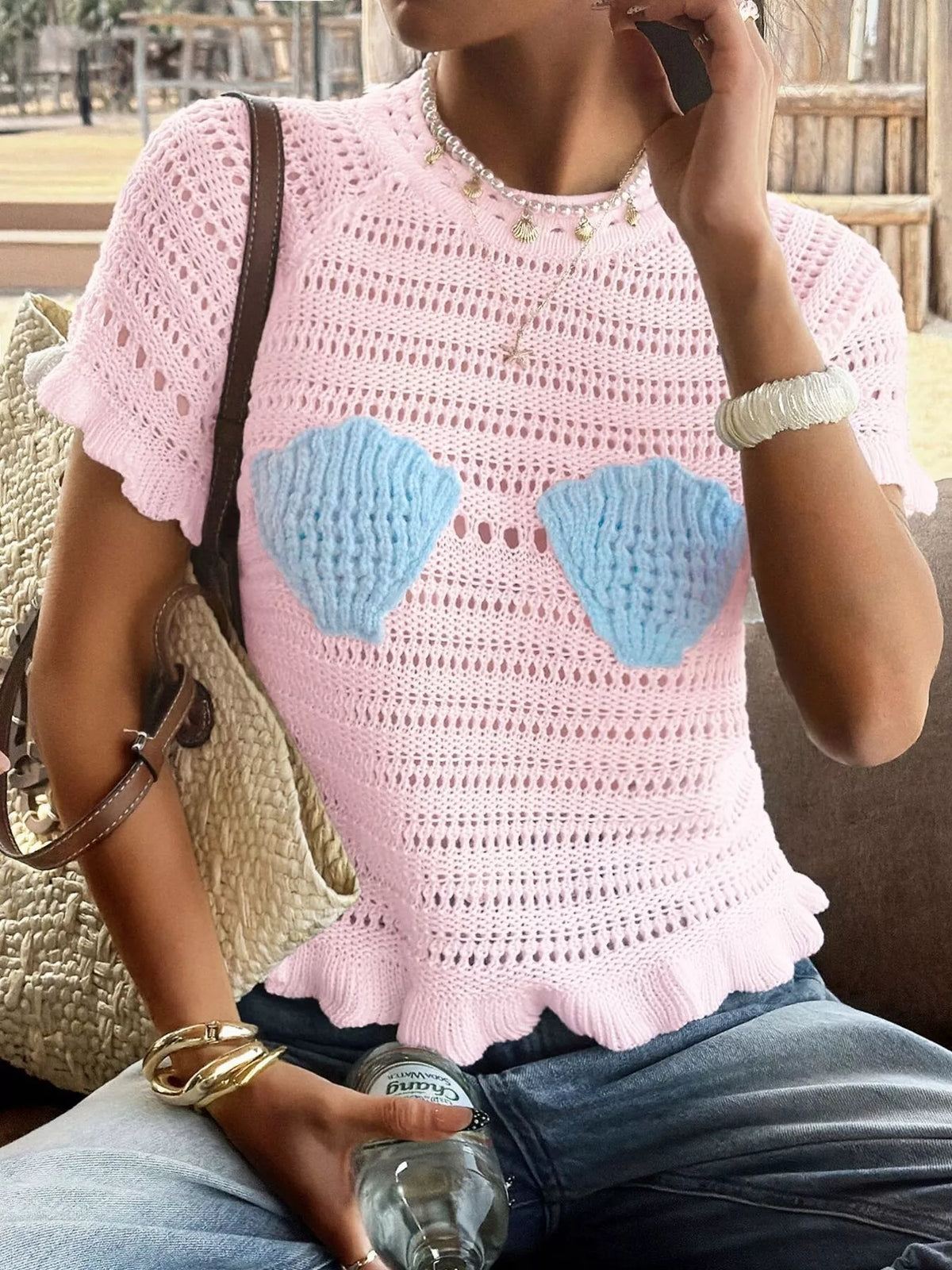Openwork ruffled hem knit top by Plush Fashion Hub, featuring a delicate openwork pattern and feminine ruffled hem detail.
