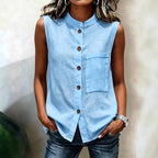 Women's sleeveless crop top with buttoned pockets by FitiqueFit, in solid color, featuring a casual style and sleeveless design.