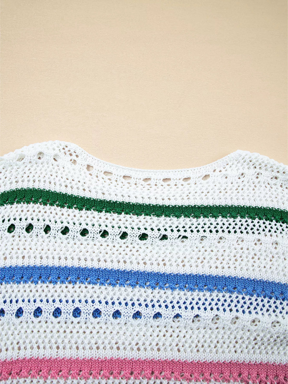 Trendsi color block striped pointelle knit sweater featuring a cozy, lightweight design with vibrant color accents and textured pattern.