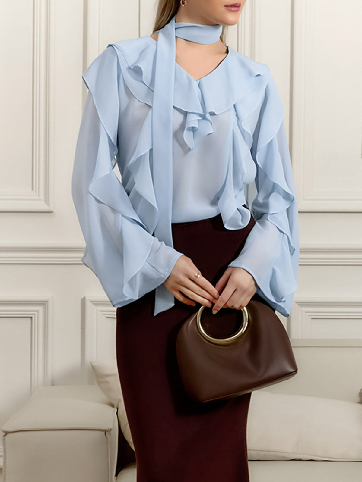 Elegant chiffon blouse with ruffle trim and tie neck by Plush Fashion Hub, featuring a stylish and feminine design.