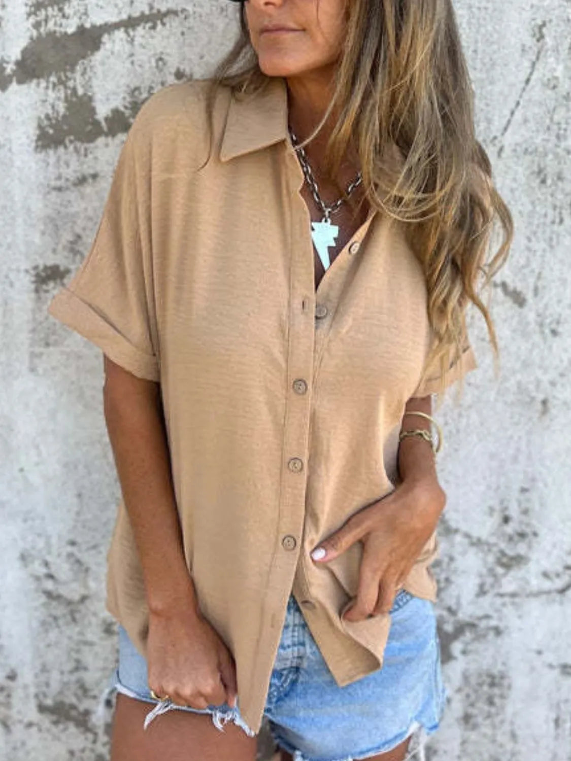 Women's collared button-down blouse from Plush Fashion Hub, half sleeve office top with a professional, stylish look.