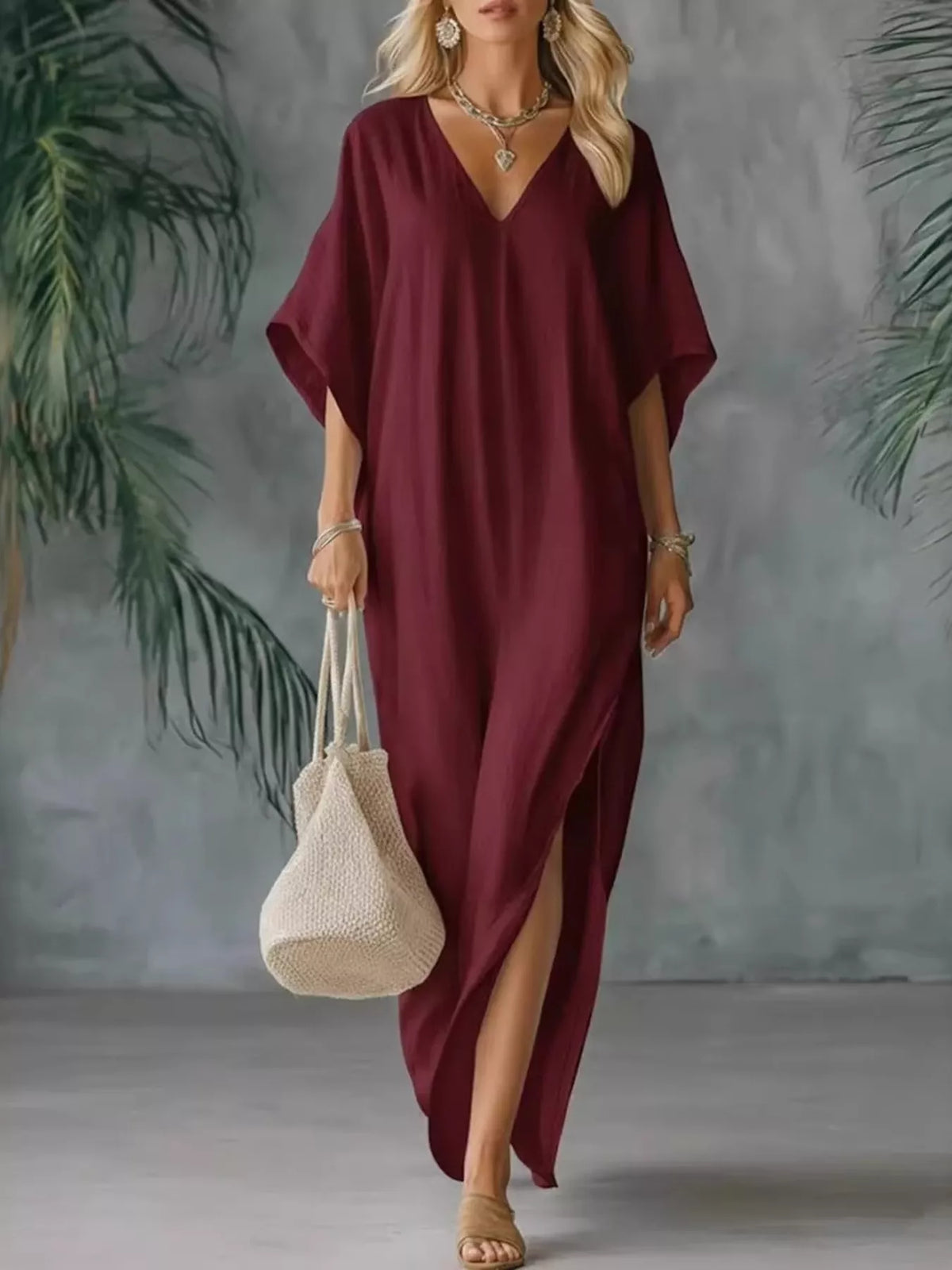 Plush Fashion Hub plus size V-neck maxi dress with side slits, flowing fabric, in full size, suitable for stylish casual wear