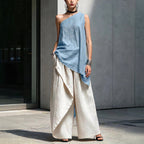 Women's one-shoulder asymmetric sleeveless top by Plush Fashion Hub, featuring a stylish and modern design with a flattering fit.