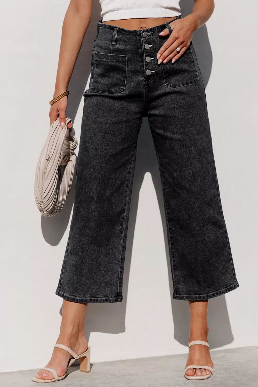 Plush Fashion Hub high-waisted wide-leg jeans with button-fly, denim fabric, and relaxed fit, shown on a model.