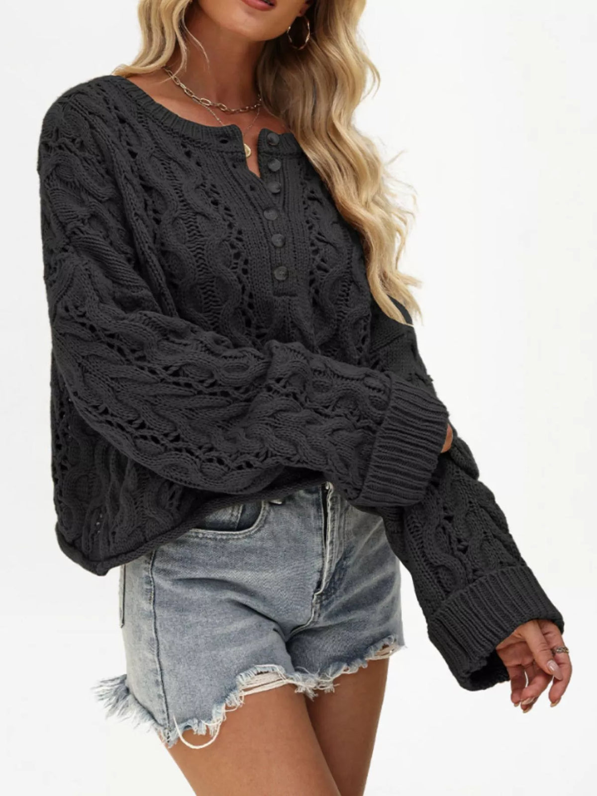 Chic cable knit half-button openwork sweater in neutral tones, featuring a cozy fit and stylish design by Trendsi.