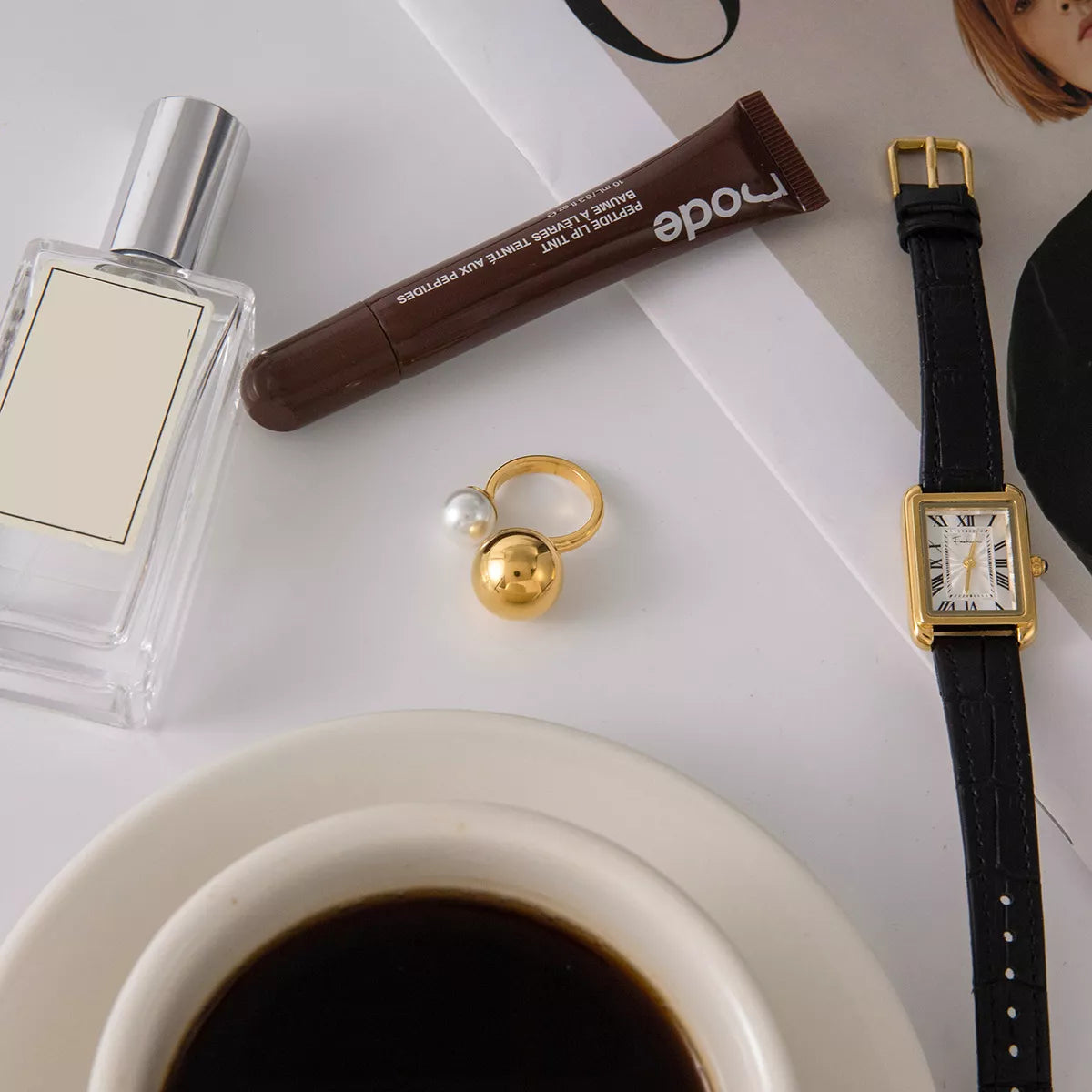 18K gold-plated ring featuring an open design with a pearl and orb embellishments, stylish jewelry from Plush Fashion Hub