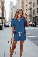 Solid color short sleeve T-shirt and shorts two-piece set from Plush Fashion Hub in multiple colors, displayed on a flat lay.