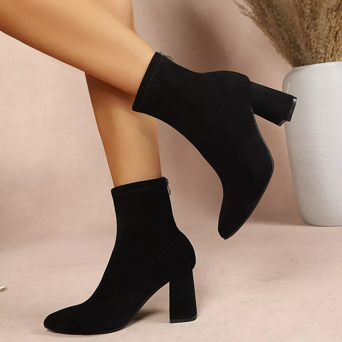 Women’s point toe block heel ankle boots by Trendsi, stylish ankle boots with a pointed toe and sturdy block heel.