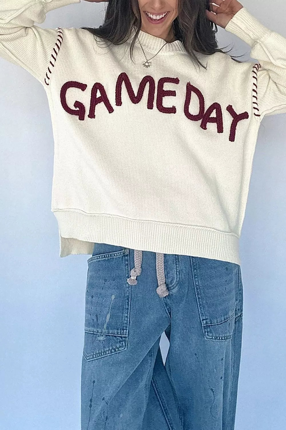 Trendsi Drop Shoulder Game Day Letter Sweater with bold letter design on a cozy knit sweater, perfect for casual wear.