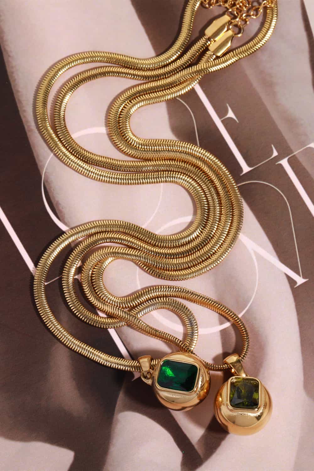 Gold-plated geometrical zircon pendant necklace featuring a modern design, crafted by Plush Fashion Hub.