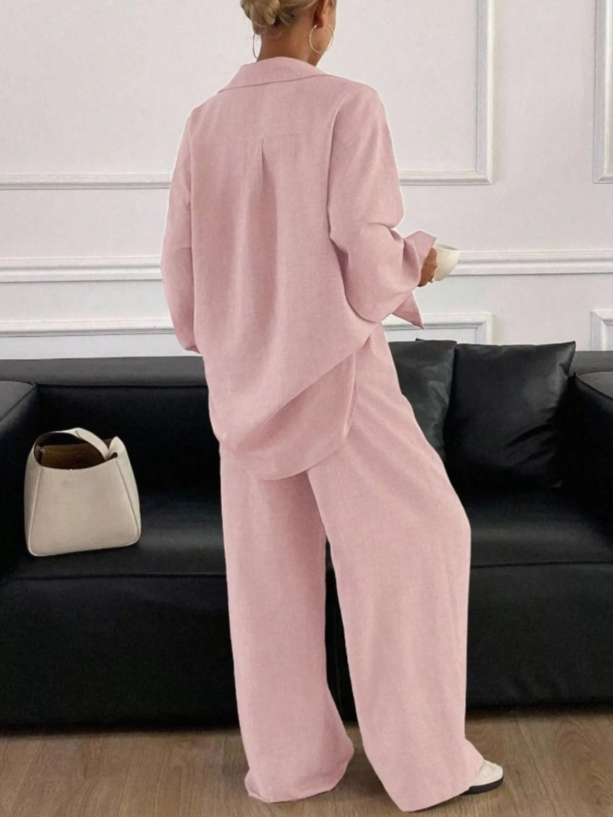 Trendsi long sleeve button-up shirt and wide-leg pants set, featuring a stylish, coordinated outfit in neutral tones.