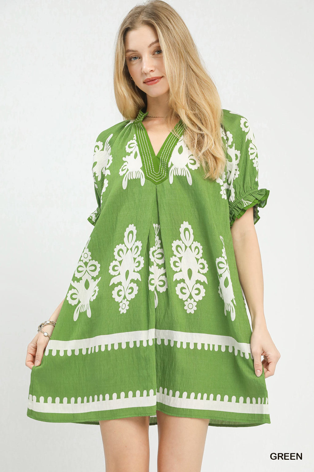 Women's two-tone border print flowy mini dress by Trendsi, perfect for casual summer boho style, featuring a breezy, relaxed fit.