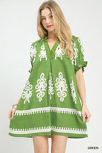 Women's two-tone border print flowy mini dress by Trendsi, perfect for casual summer boho style, featuring a breezy, relaxed fit.
