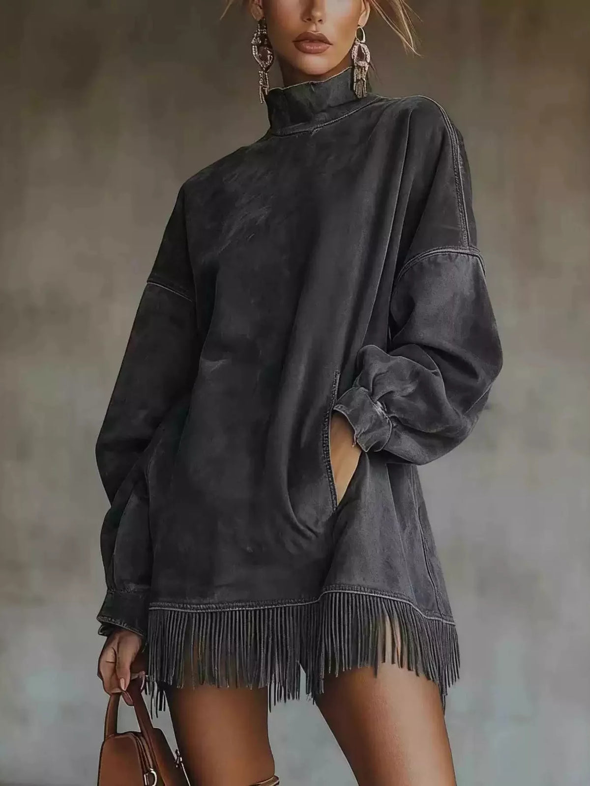 Plus size full size mock neck long sleeve mini dress with fringed hem, from Trendsi, styled as a cozy sweater or cardigan.