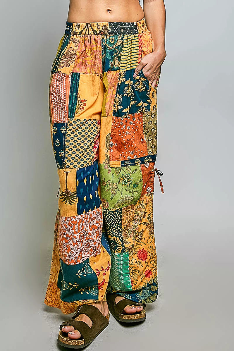 Cotton printed patchwork wide-leg pants with side drawstring from Plush Fashion Hub, styled as a casual dress in the image.