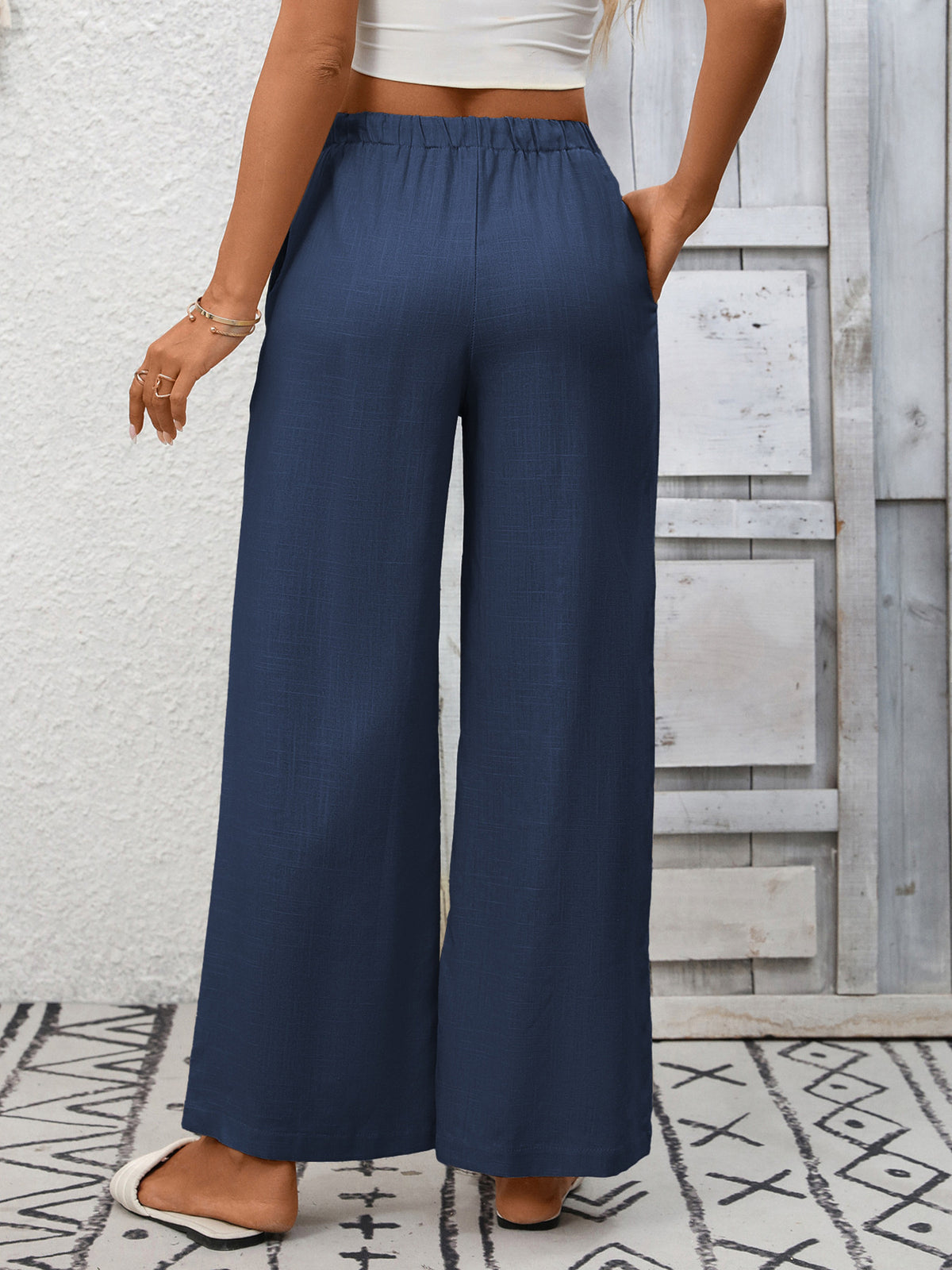 Women's high-waisted wide-leg drawstring pants in soft breathable viscose from Plush Fashion Hub, shown in a relaxed fit.
