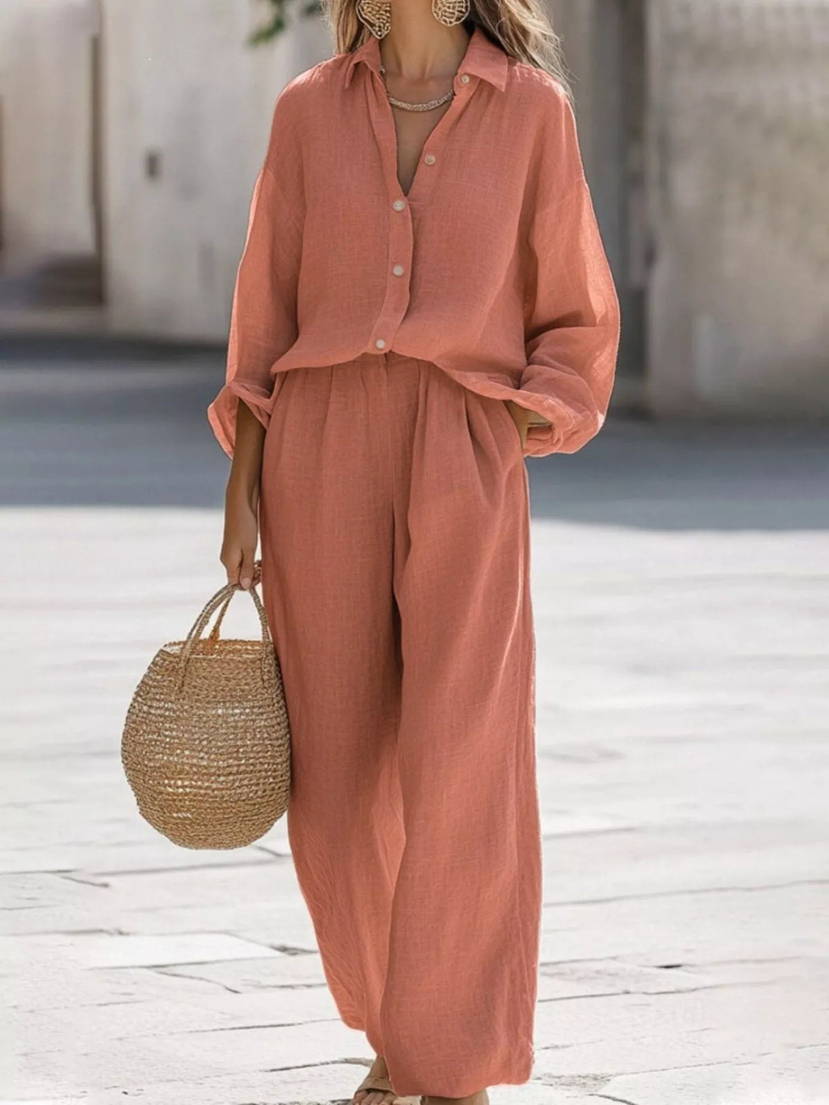 Plus size loose fit shirt and wide leg pants matching set by Trendsi, featuring comfortable, casual style with relaxed fit.