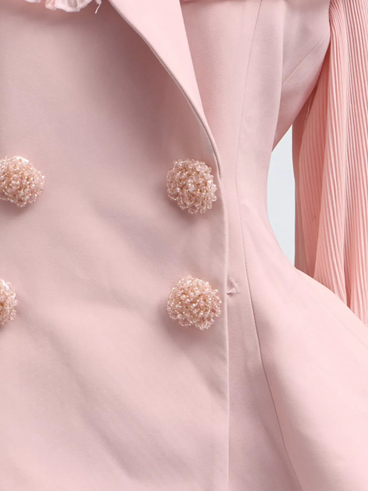Plush Fashion Hub two-piece set featuring a frill lapel collar top and pleated skirt displayed on a hanger.