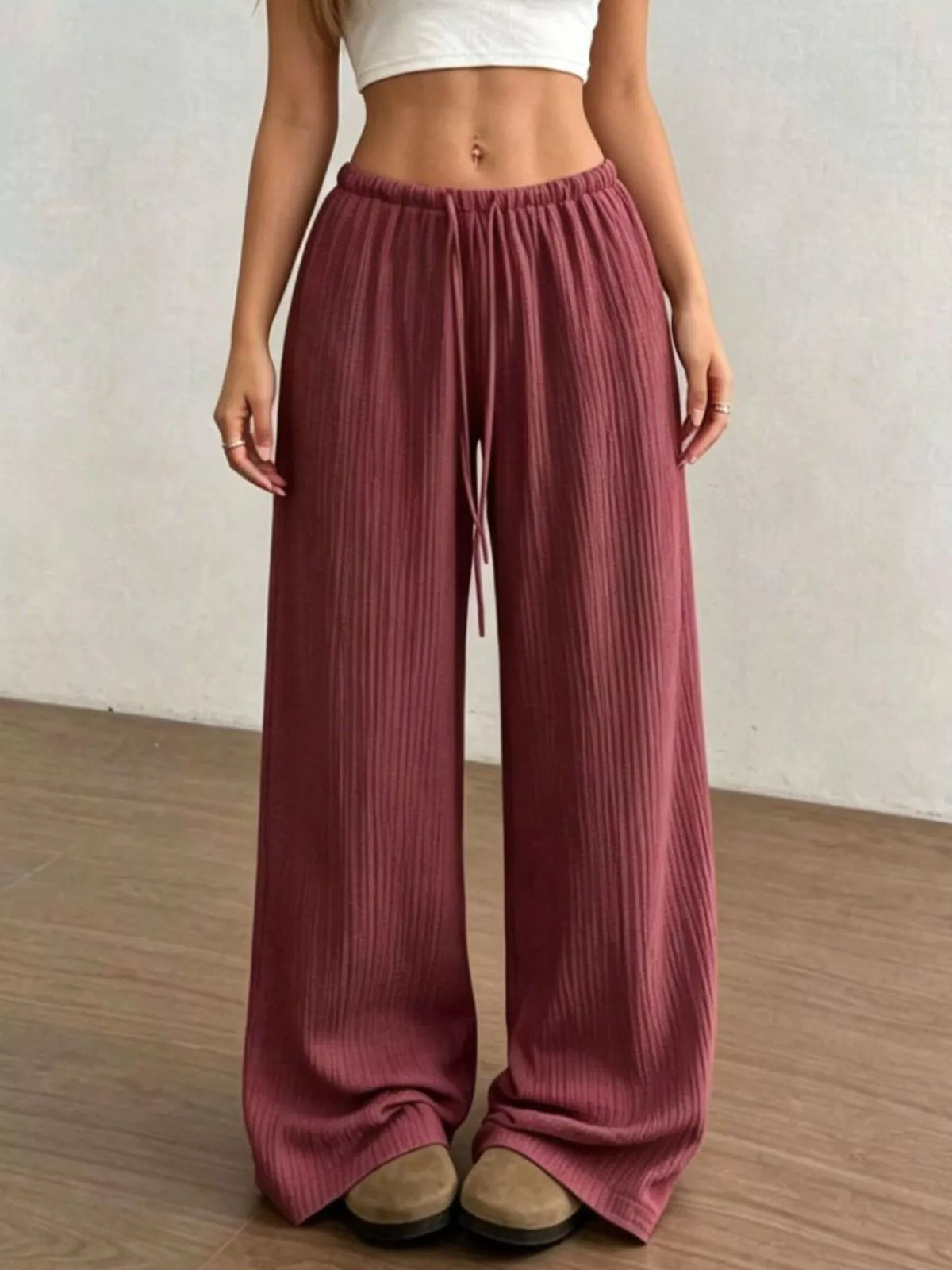 Plush Fashion Hub wide-leg drawstring pants with soft plush fabric and relaxed fit, shown in a stylish casual outfit.