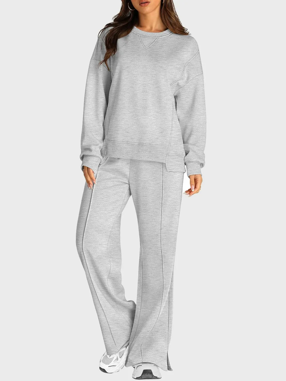 Trendsi round neck long sleeve top and slit pants set, stylish casual outfit, featuring a fitted top and flowy slit pants.