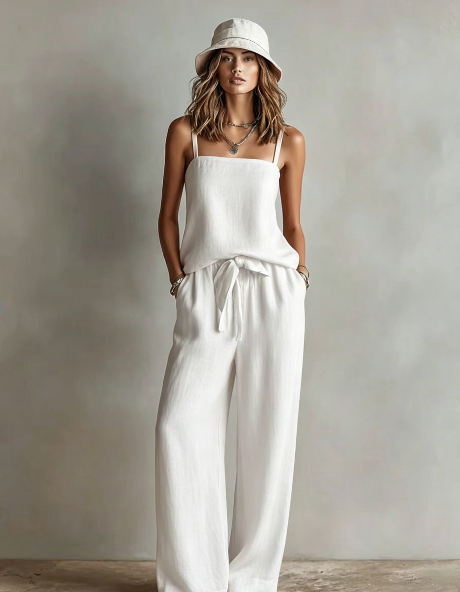 FitiqueFit women's casual two-piece set with spaghetti strap cami top and wide-leg pants, shown in a relaxed fit and stylish design.