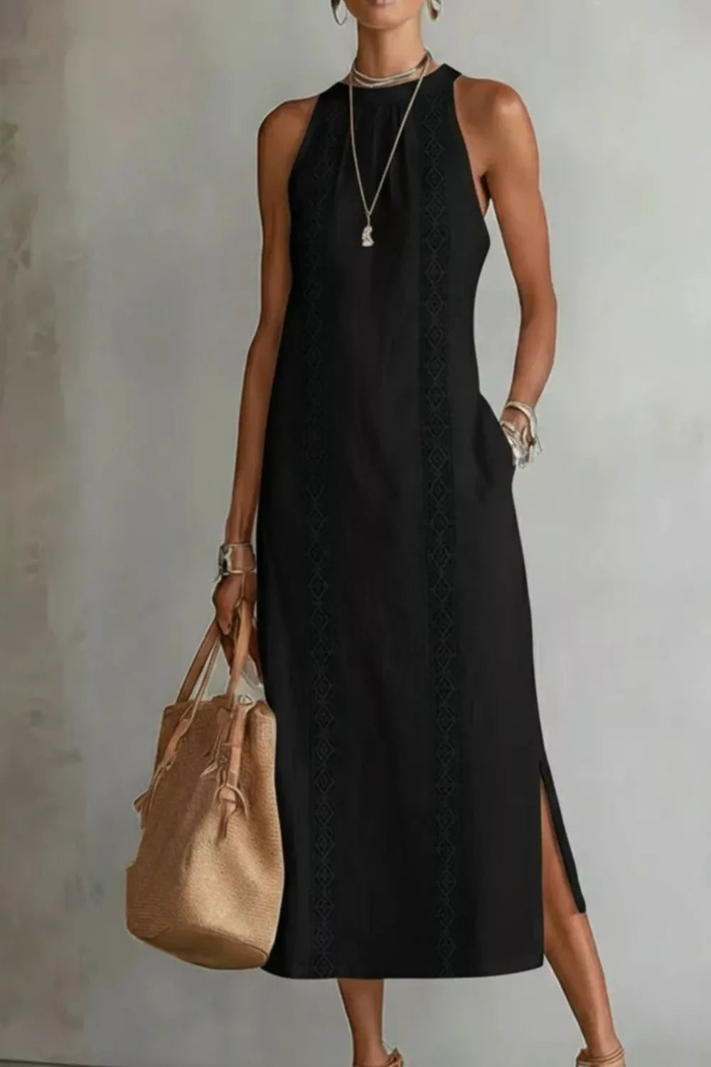 Women's sleeveless maxi dress with side slit and pockets, trendy Trendsi dress made of flowing fabric, perfect for summer or casual wear.