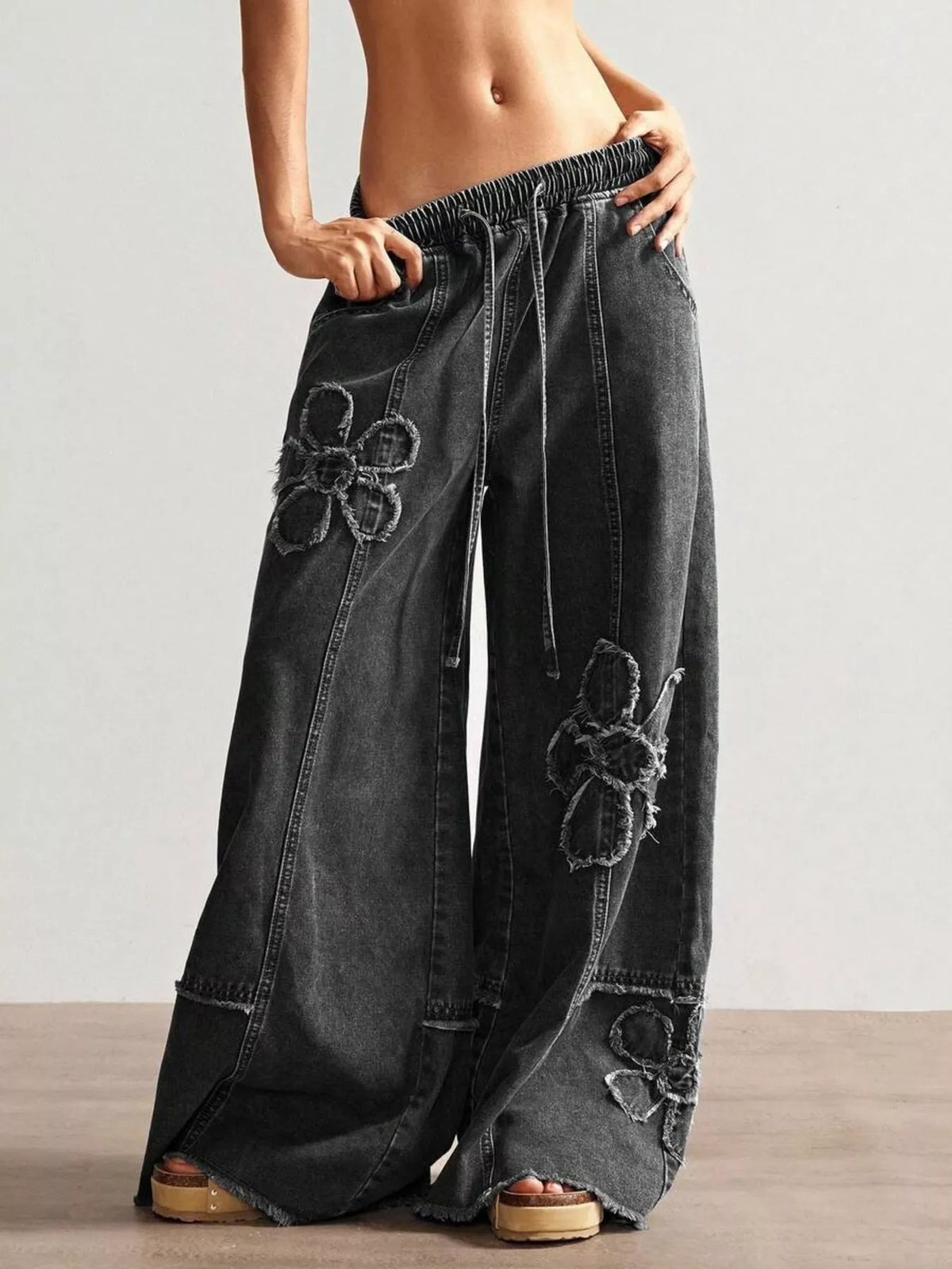 Trendsi Women Flower Wide Leg Jeans with floral pattern, high-waisted fit, and relaxed wide-leg style, perfect for casual wear