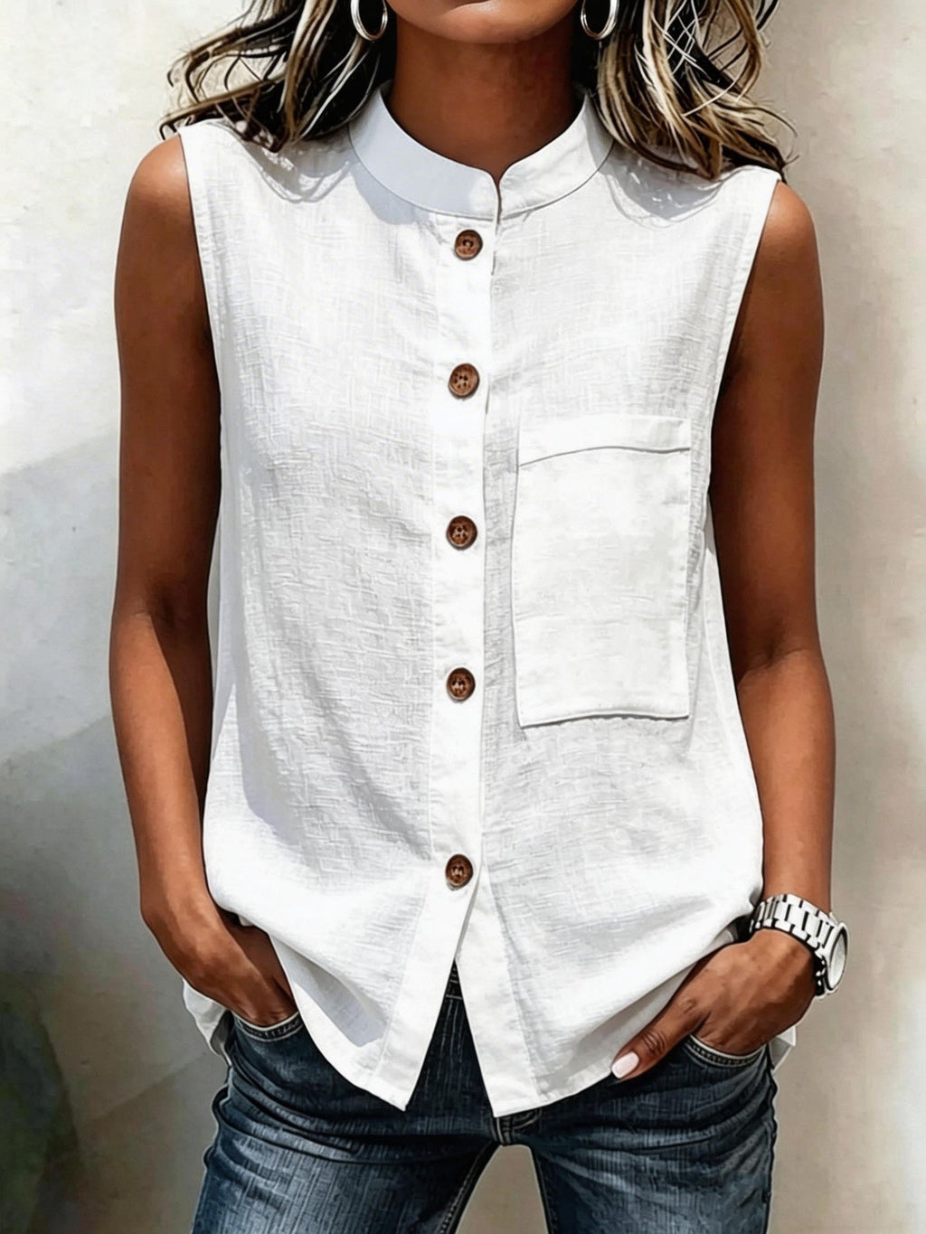 Women's sleeveless crop top with buttoned pockets in solid color, casualwear by FitiqueFit, shown in a water-themed setting