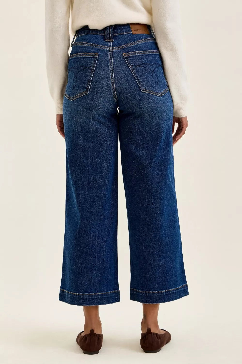 Plush Fashion Hub Judy Blue high waist T.C. Claudia ankle wide jeans with distressed detailing and a relaxed fit.
