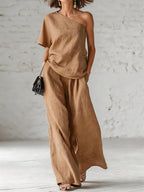 Women's wide-leg pants and top set by FitiqueFit, casualwear three-quarter sleeve outfit, featuring comfortable, stylish fabric and fit.