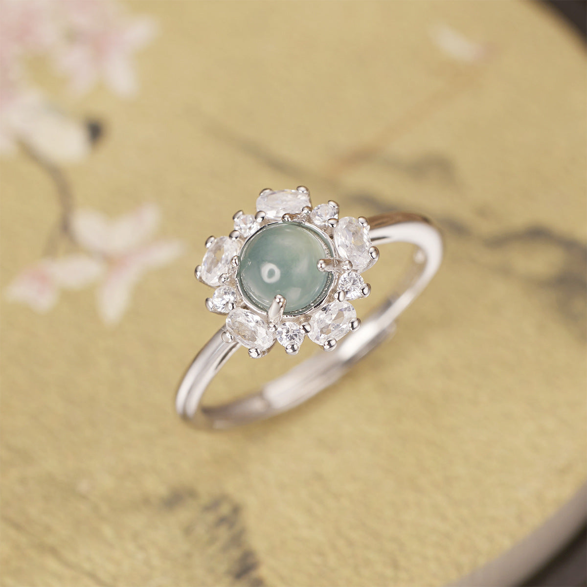 925 sterling silver jadeite ring with smooth polished band and vibrant green jadeite stone, perfect for elegant jewelry.