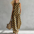Casual women's sleeveless printed tank top and wide-leg pants two-piece set by Plush Fashion Hub, shown on a model.