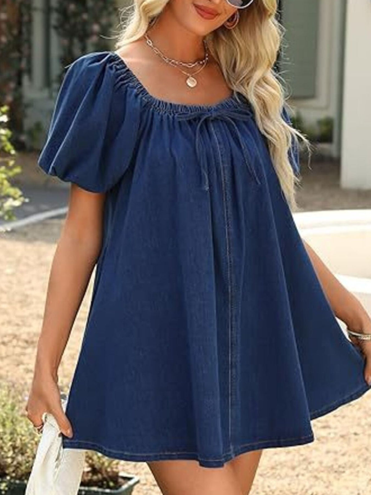 Women’s off-shoulder tie-front denim mini dress by Plush Fashion Hub, showing the dress with ruffled neckline and fitted silhouette.