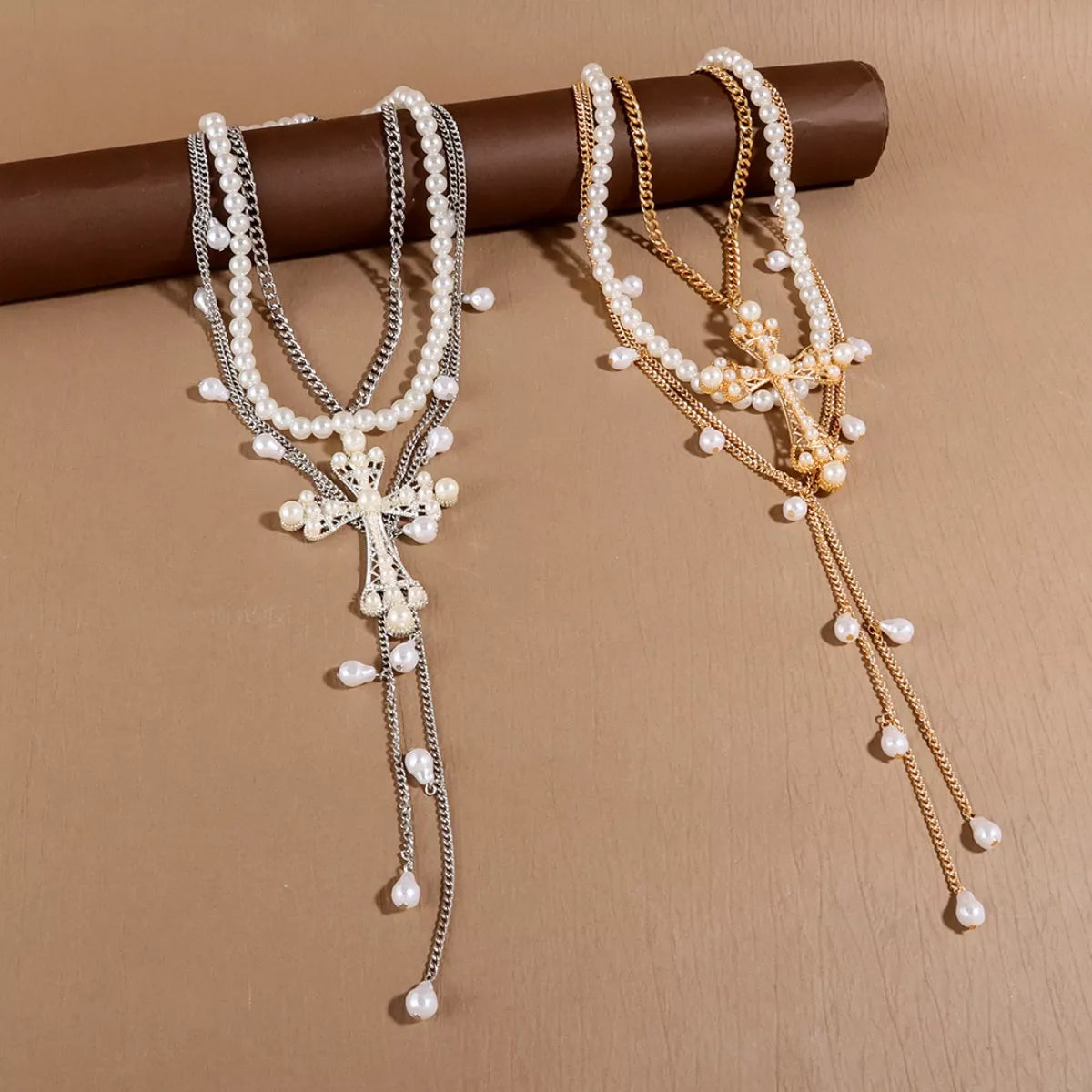 Three-piece Pearl Cross Pendant Necklace set by Plush Fashion Hub featuring elegant pearl and cross pendant designs.