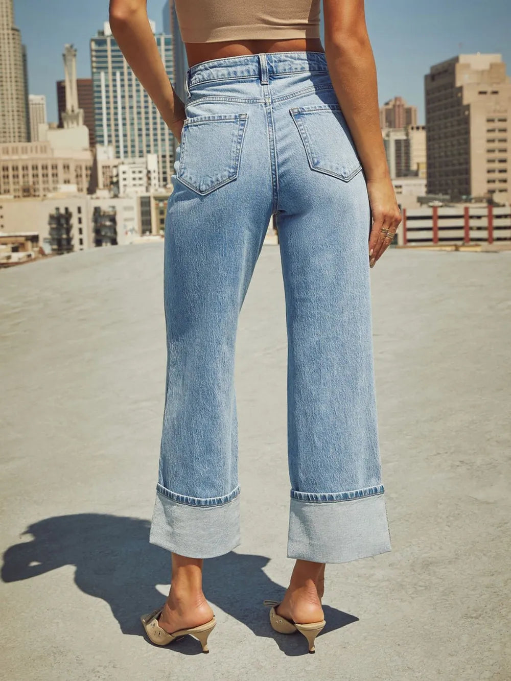 Trendsi high-waisted straight-leg rolled denim jeans showing front view with classic blue wash and casual style.