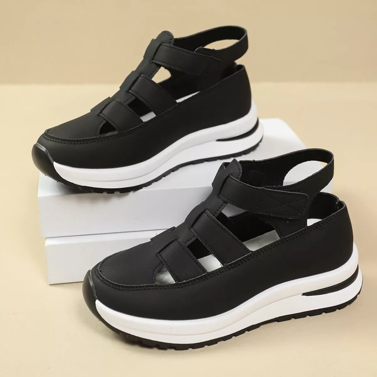 Platform sandals with cutout round toe design by Plush Fashion Hub, featuring a stylish open-toe silhouette and chunky sole.