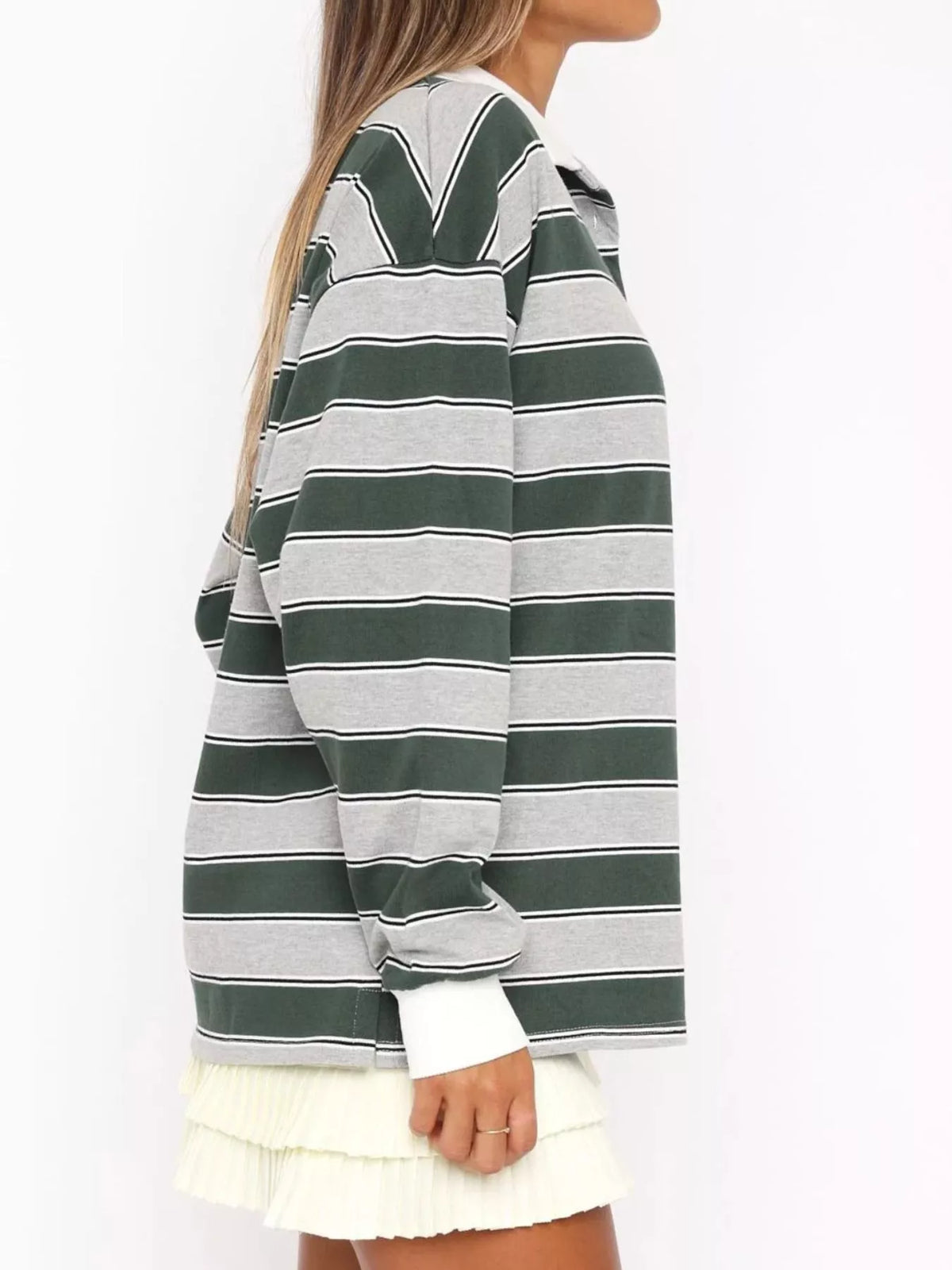 Striped long sleeve polo shirt with button details from Plush Fashion Hub, featuring a classic collar and fitted design.