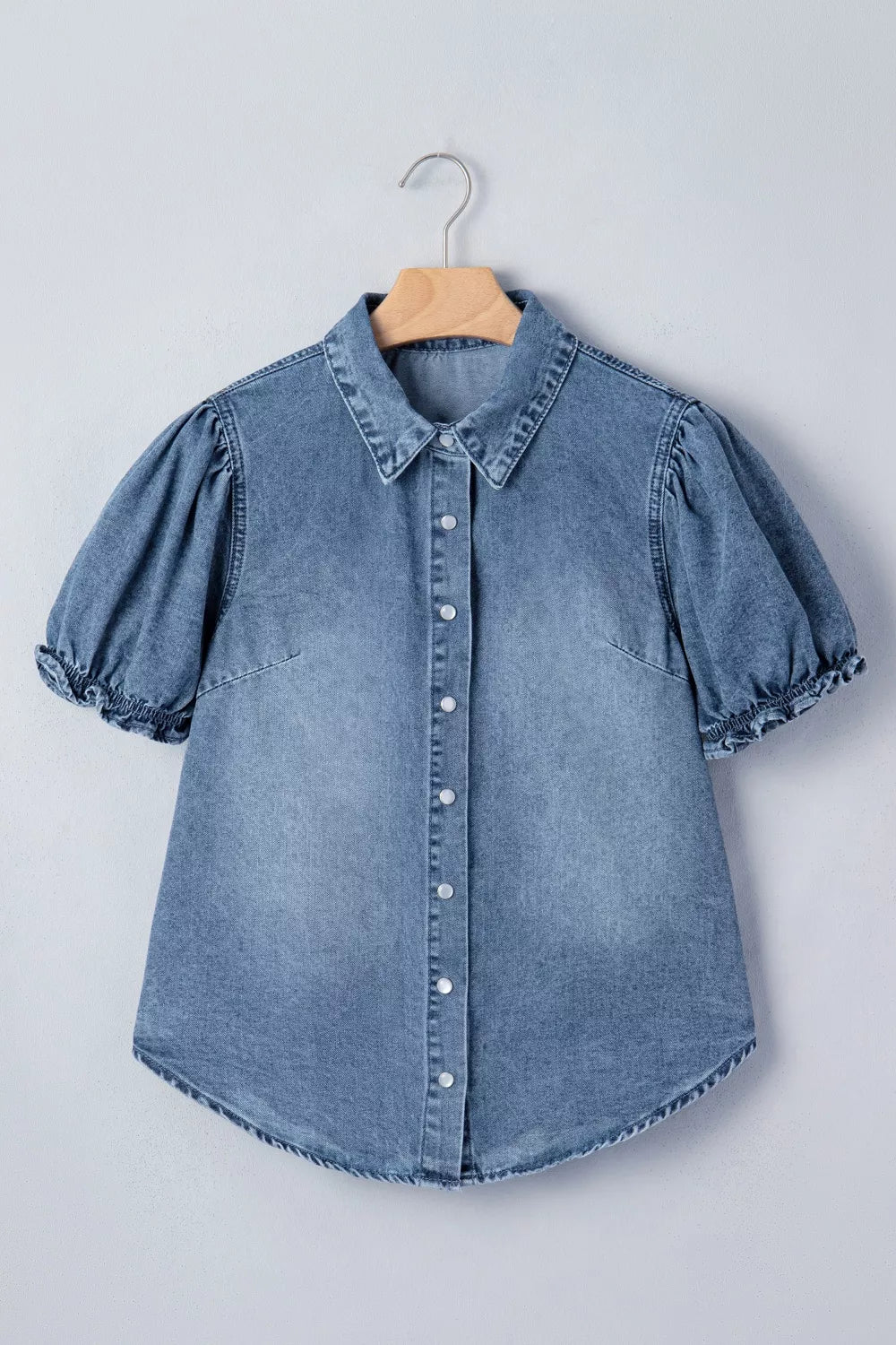 Plush Fashion Hub frilled short sleeve denim shirt with snap buttons, featuring a stylish and casual design.