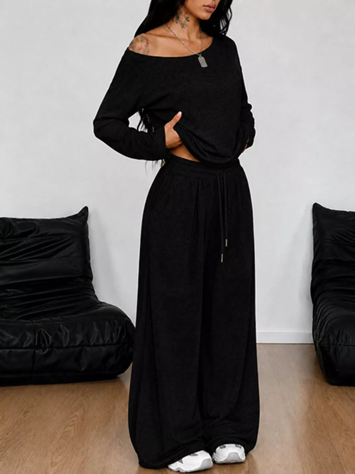 Plus size one-shoulder top and drawstring pants matching set by Trendsi, featuring a stylish, comfortable full-size ensemble.