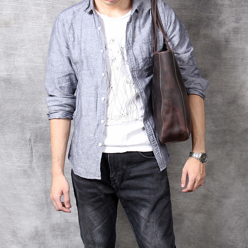 Simple retro cowhide large-capacity men's handbag by Pi-Mart, featuring a classic design and durable leather construction.
