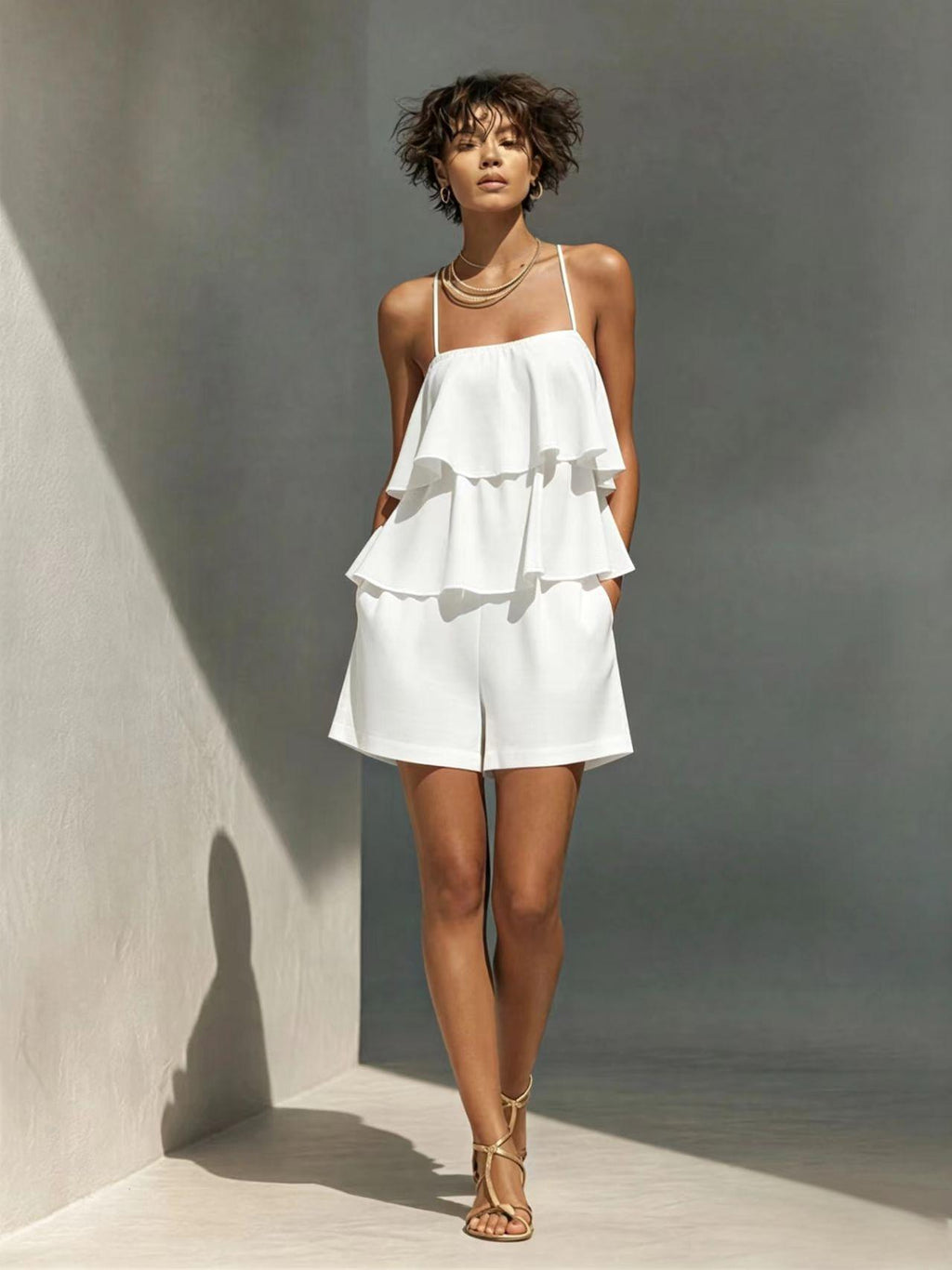 Women's multi-layer ruffle camisole and shorts set in casualwear style, featuring ruffled details and comfortable fit.