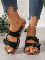 Women's double-buckle strap flat sandals by Trendsi with adjustable straps and comfortable flat sole, perfect for casual walking.