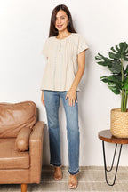Women's boho chic crochet button-down short sleeve top with a relaxed fit, perfect for summer fashion.