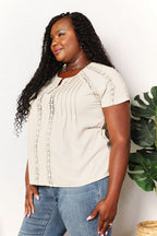 Women's short sleeve crochet button-down top, boho chic summer blouse with a relaxed fit and stylish design.