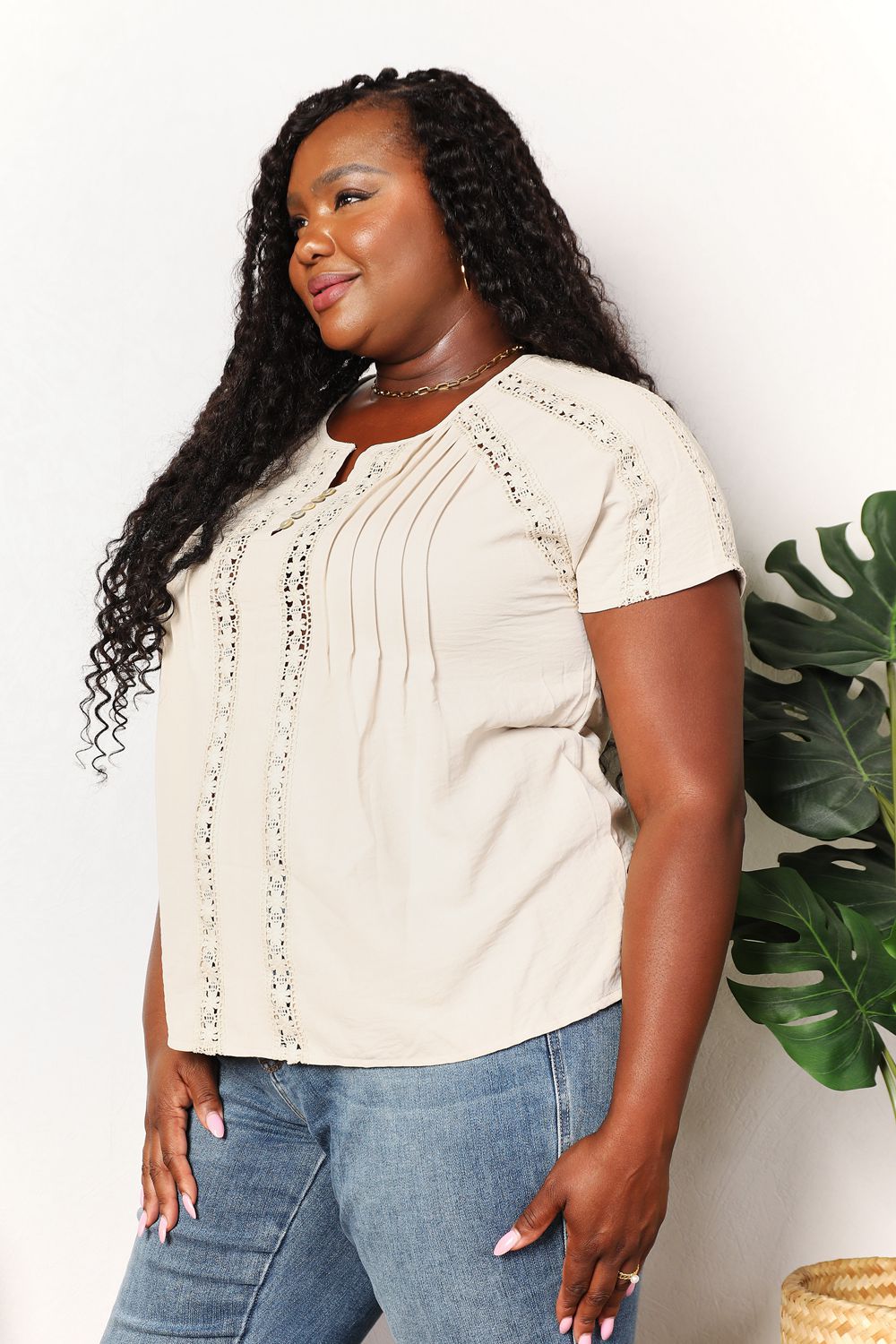 Women's short sleeve crochet button-down top, boho chic summer blouse with a relaxed fit and stylish design.