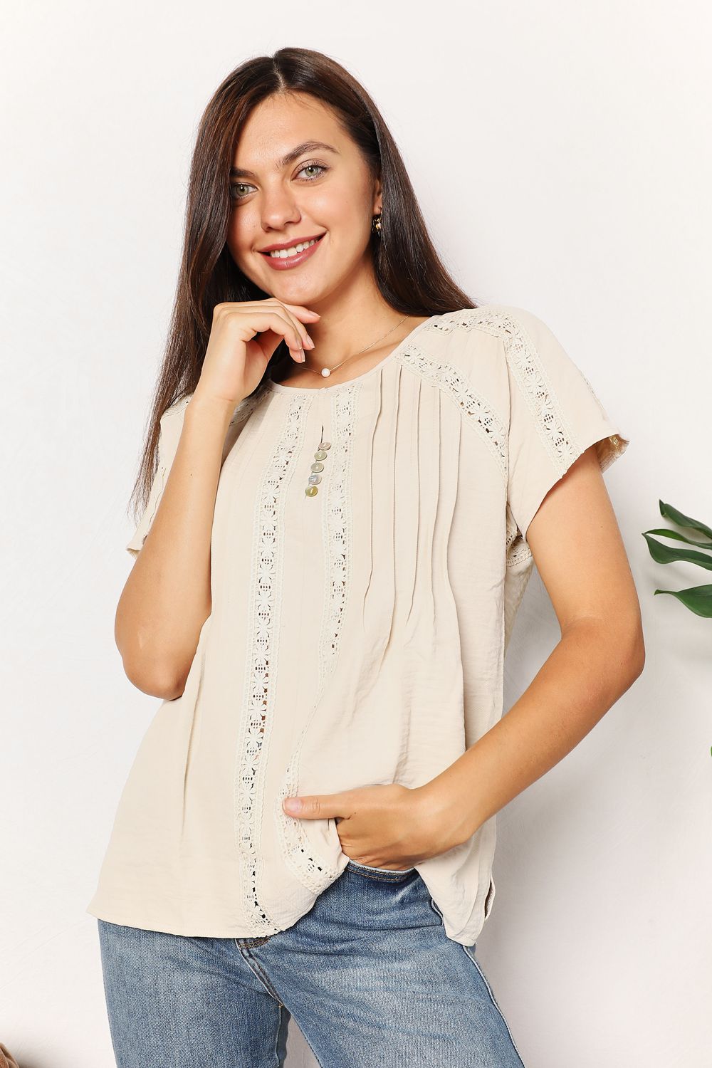 Women's boho chic crochet button-down short sleeve top by Trendsi, featuring a relaxed summer blouse with a stylish collar.